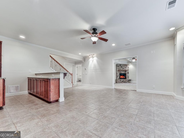 414 Candler Trl, Canton, GA 30115 - unfurnished living room with a ceiling fan, crown molding, stairway, recessed lighting, and light tile patterned flooring