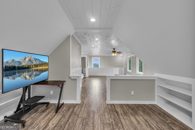 additional living space with wood finished floors, ceiling fan, wooden ceiling, and built in shelves