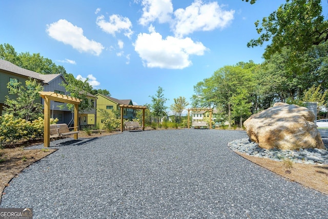 1429 Hazy Way Unit 309, Atlanta, GA 30315 - view of property's community with a residential view and a pergola