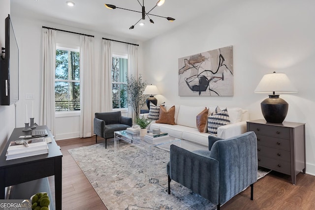 1429 Hazy Way Unit 309, Atlanta, GA 30315 - living room featuring a chandelier, wood finished floors, and recessed lighting