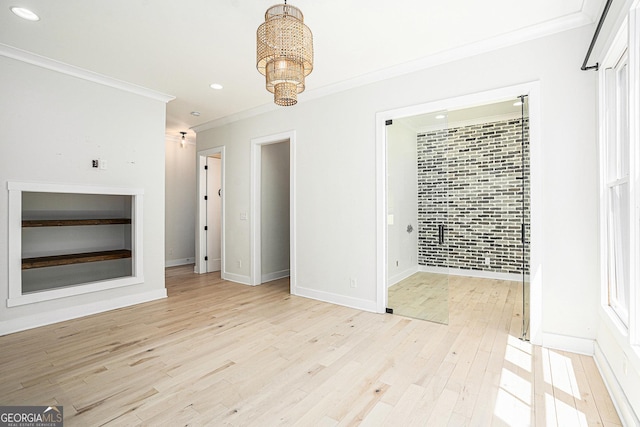 4276 Lindsey Way NE, Roswell, GA 30075 - unfurnished dining area with ornamental molding, recessed lighting, light wood finished floors, baseboards, and a chandelier