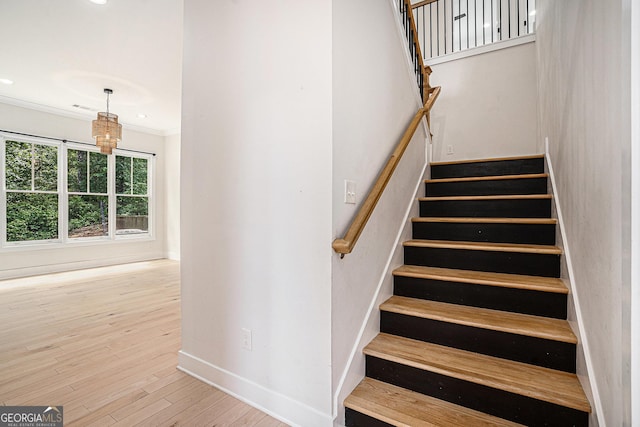 4276 Lindsey Way NE, Roswell, GA 30075 - staircase with baseboards, wood finished floors, ornamental molding, and recessed lighting