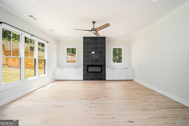 4276 Lindsey Way NE, Roswell, GA 30075 - unfurnished living room featuring ornamental molding, a ceiling fan, light wood-type flooring, baseboards, and a fireplace