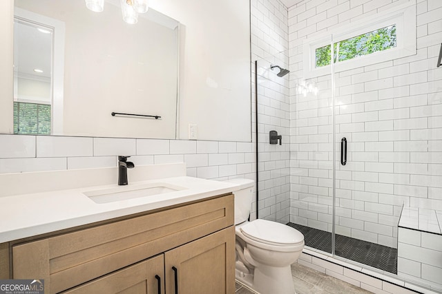 4276 Lindsey Way NE, Roswell, GA 30075 - full bathroom featuring tile walls, a stall shower, vanity, and toilet