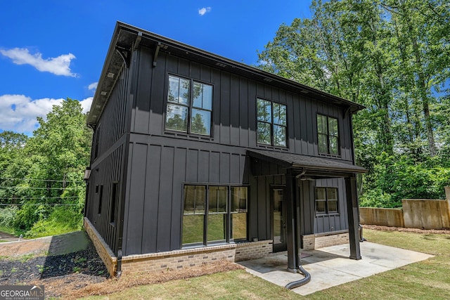4276 Lindsey Way NE, Roswell, GA 30075 - rear view of house with board and batten siding