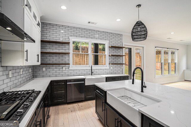 4276 Lindsey Way NE, Roswell, GA 30075 - kitchen featuring open shelves, dishwasher, under cabinet range hood, ornamental molding, and black gas stovetop