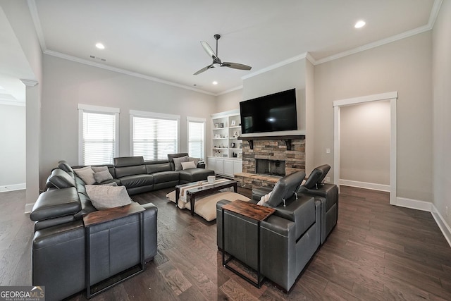 485 Discovery Lake Dr, Fayetteville, GA 30215 - living area featuring a ceiling fan, baseboards, crown molding, a stone fireplace, and recessed lighting