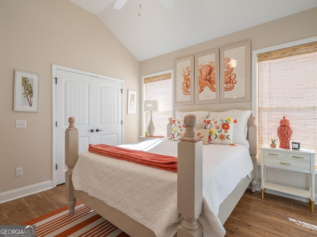 137 Ryan Nicholas Dr, Kingsland, GA 31548 - bedroom featuring dark wood-style flooring, lofted ceiling, a closet, baseboards, and ceiling fan