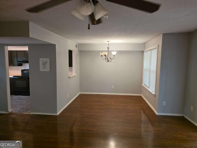 unfurnished dining area with a ceiling fan, wood finished floors, a chandelier, a textured ceiling, and baseboards