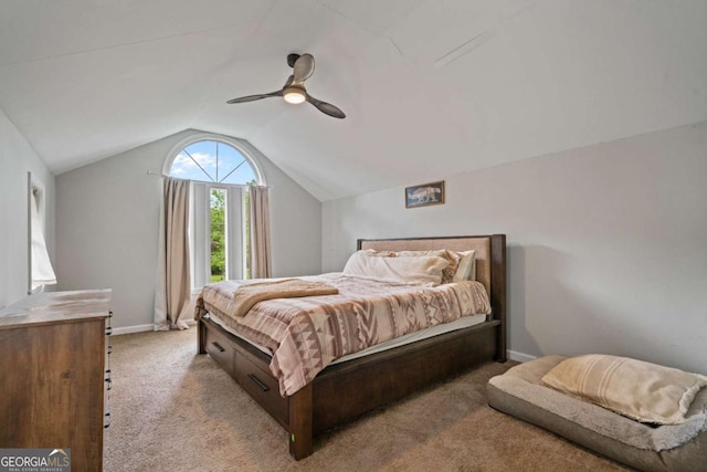 bedroom featuring vaulted ceiling, carpet floors, a ceiling fan, and baseboards