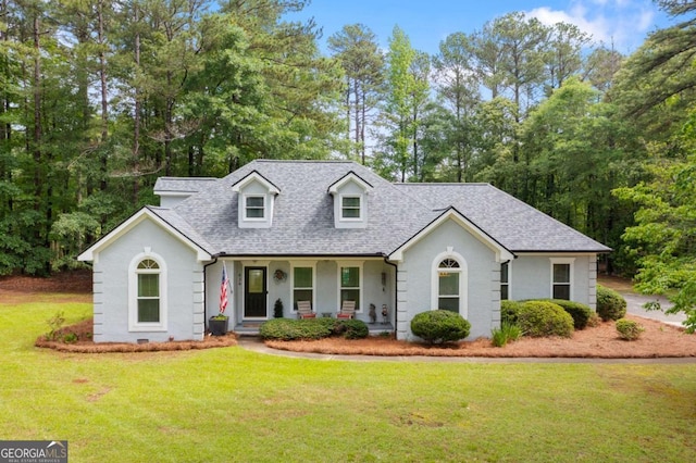 836 Palmetto Tyrone Rd, Sharpsburg, GA 30277 - cape cod home featuring a shingled roof, a front yard, covered porch, and view of scattered trees