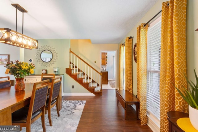 836 Palmetto Tyrone Rd, Sharpsburg, GA 30277 - dining space featuring wood finished floors, baseboards, stairway, and healthy amount of natural light
