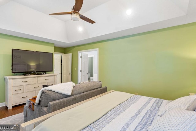 836 Palmetto Tyrone Rd, Sharpsburg, GA 30277 - bedroom with dark wood-style floors, lofted ceiling, baseboards, ensuite bath, and a ceiling fan