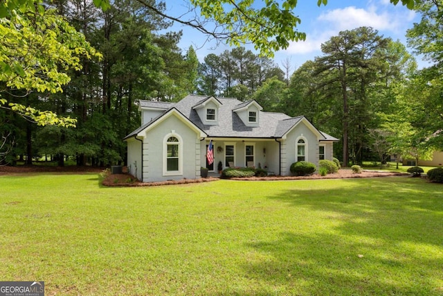 836 Palmetto Tyrone Rd, Sharpsburg, GA 30277 - cape cod home with a front yard, roof with shingles, and view of wooded area