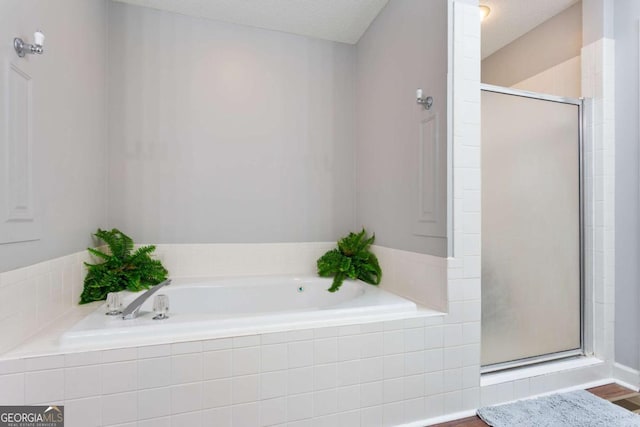 836 Palmetto Tyrone Rd, Sharpsburg, GA 30277 - full bathroom featuring a shower stall and a garden tub