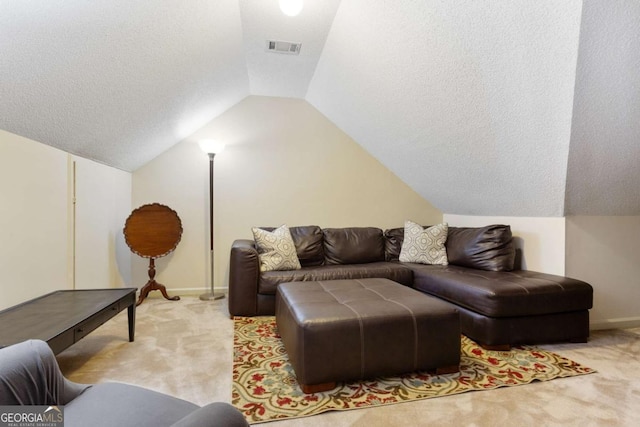 836 Palmetto Tyrone Rd, Sharpsburg, GA 30277 - living room with light colored carpet, lofted ceiling, a textured ceiling, and baseboards