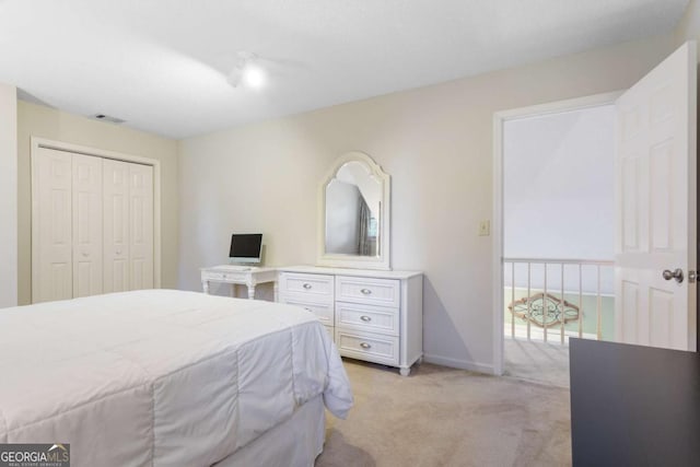 836 Palmetto Tyrone Rd, Sharpsburg, GA 30277 - bedroom featuring light colored carpet, a closet, and baseboards