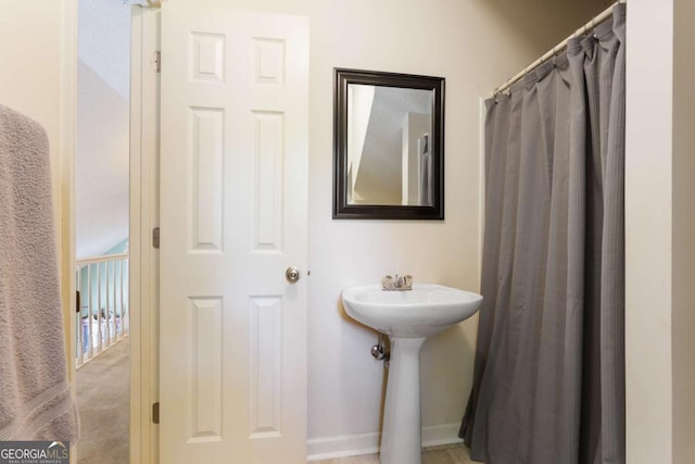 836 Palmetto Tyrone Rd, Sharpsburg, GA 30277 - bathroom featuring baseboards and a sink