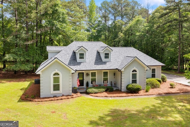836 Palmetto Tyrone Rd, Sharpsburg, GA 30277 - cape cod-style house with a porch, a shingled roof, and a front yard