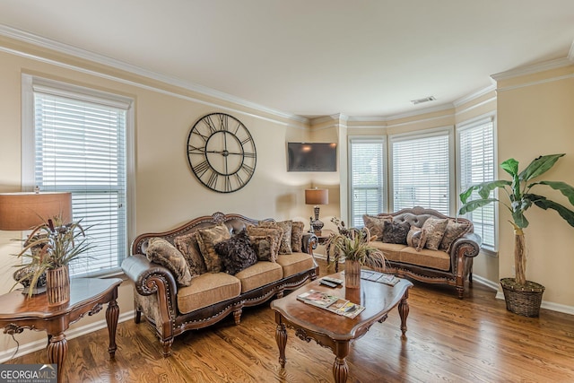 5342 Lakerock Dr SW, South Fulton, GA 30331 - living area with wood finished floors, crown molding, and baseboards