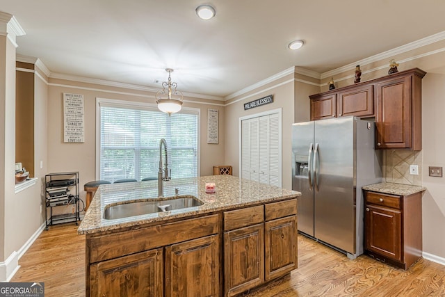 5342 Lakerock Dr SW, South Fulton, GA 30331 - kitchen with a sink, stainless steel fridge, light wood-type flooring, and crown molding