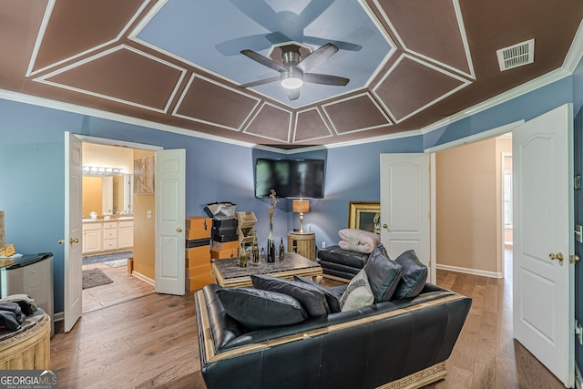 5342 Lakerock Dr SW, South Fulton, GA 30331 - living area with ceiling fan, ornamental molding, wood finished floors, and baseboards