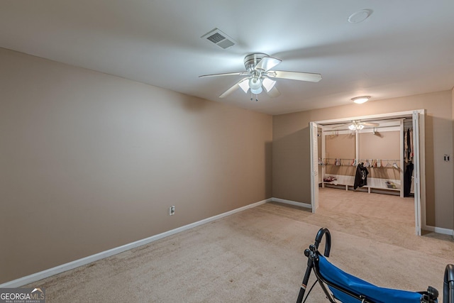 5342 Lakerock Dr SW, South Fulton, GA 30331 - exercise room with carpet, a ceiling fan, and baseboards