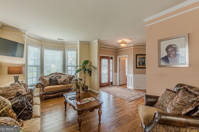 5342 Lakerock Dr SW, South Fulton, GA 30331 - living area featuring wood finished floors, wainscoting, and crown molding