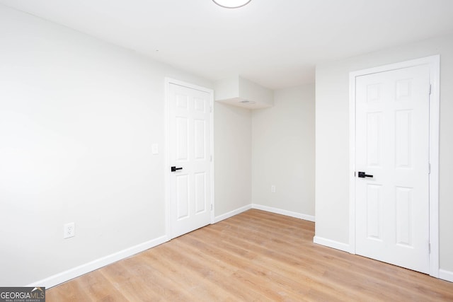 2131 Glendale Dr, Decatur, GA 30032 - below grade area with light wood finished floors and baseboards