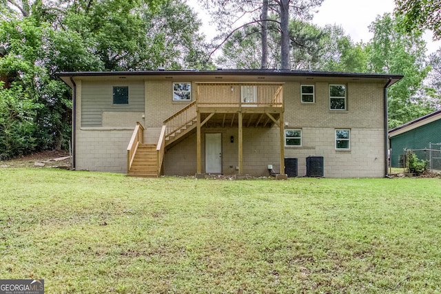 2131 Glendale Dr, Decatur, GA 30032 - back of property with stairs, brick siding, a wooden deck, and central AC unit