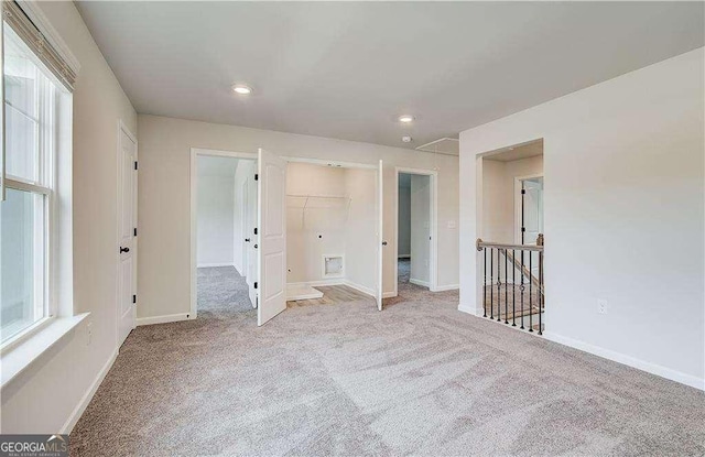 242 Linford Dr, Locust Grove, GA 30248 - carpeted empty room featuring recessed lighting and healthy amount of natural light