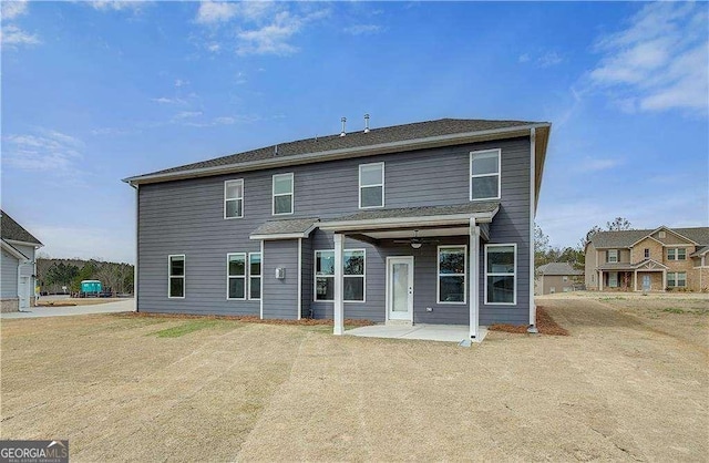 242 Linford Dr, Locust Grove, GA 30248 - back of property with a patio area and a ceiling fan