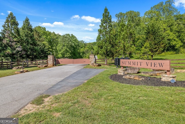 community sign with a gate
