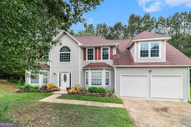 4615 Thermal Ct, Douglasville, GA 30135 - view of front of property with concrete driveway, roof with shingles, a front yard, and a garage