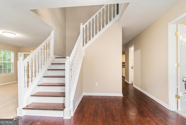 4615 Thermal Ct, Douglasville, GA 30135 - stairs with wood finished floors, baseboards, and a textured ceiling