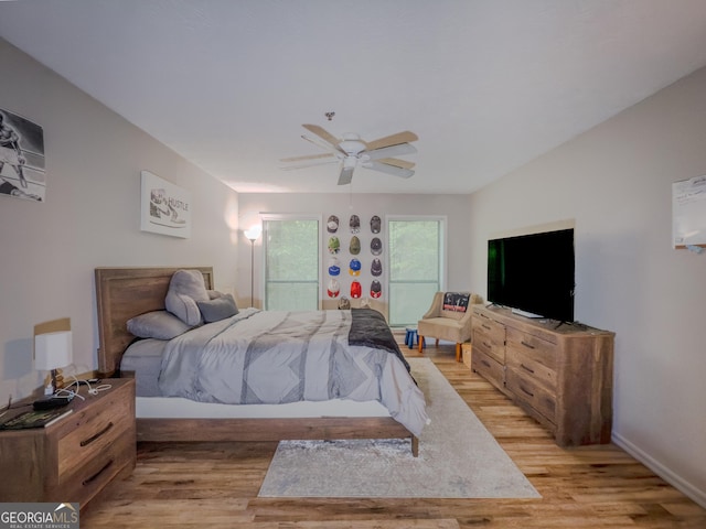 2610 Cumberland Ct, Smyrna, GA 30080 - bedroom featuring light wood-style floors, ceiling fan, and baseboards