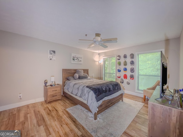 2610 Cumberland Ct, Smyrna, GA 30080 - bedroom featuring light wood-style floors, baseboards, and ceiling fan