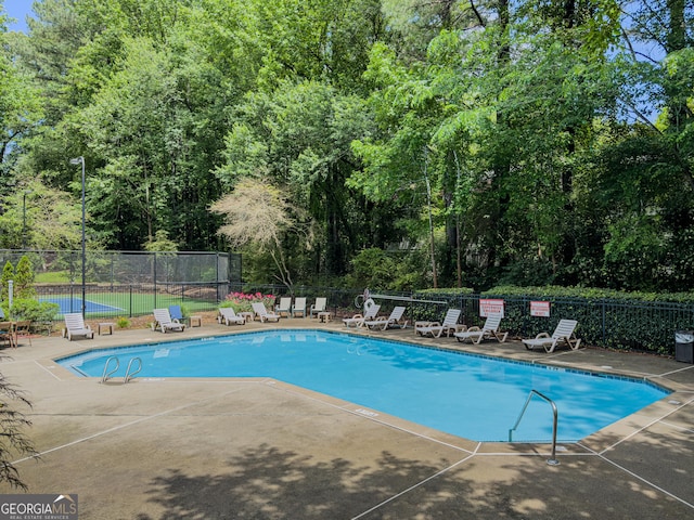 2610 Cumberland Ct, Smyrna, GA 30080 - community pool featuring fence and a patio