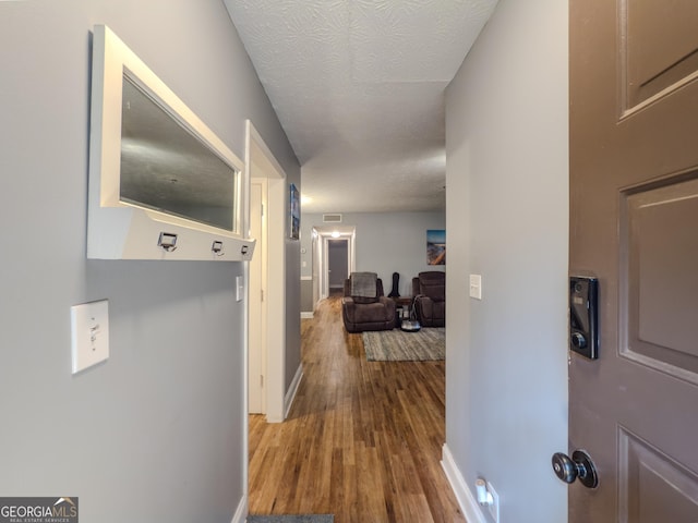 2610 Cumberland Ct, Smyrna, GA 30080 - hallway featuring wood finished floors and baseboards