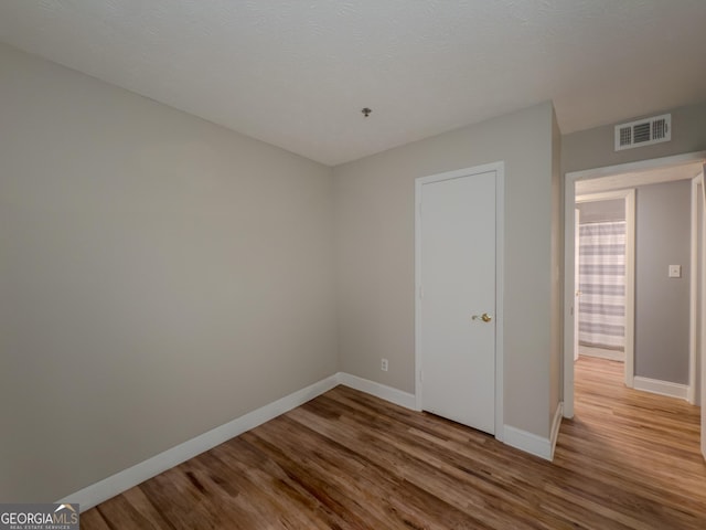 2610 Cumberland Ct, Smyrna, GA 30080 - empty room with wood finished floors and baseboards