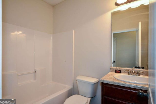 full bath featuring vanity, toilet, and bathing tub / shower combination