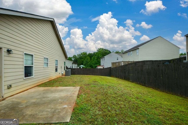 view of yard featuring a patio area and cooling unit
