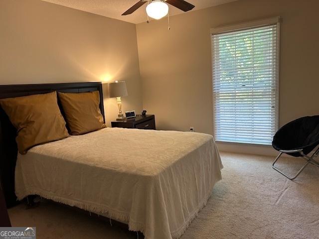 1009 Hunters Pointe Dr, Statesboro, GA 30461 - carpeted bedroom with ceiling fan