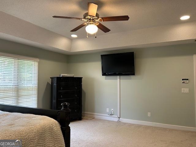 1009 Hunters Pointe Dr, Statesboro, GA 30461 - bedroom with light carpet, baseboards, recessed lighting, and a ceiling fan