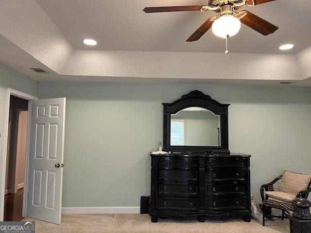 1009 Hunters Pointe Dr, Statesboro, GA 30461 - bedroom featuring carpet flooring, baseboards, ceiling fan, a tray ceiling, and recessed lighting