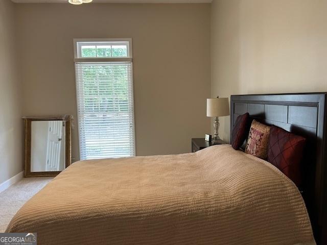 1009 Hunters Pointe Dr, Statesboro, GA 30461 - bedroom featuring carpet and baseboards