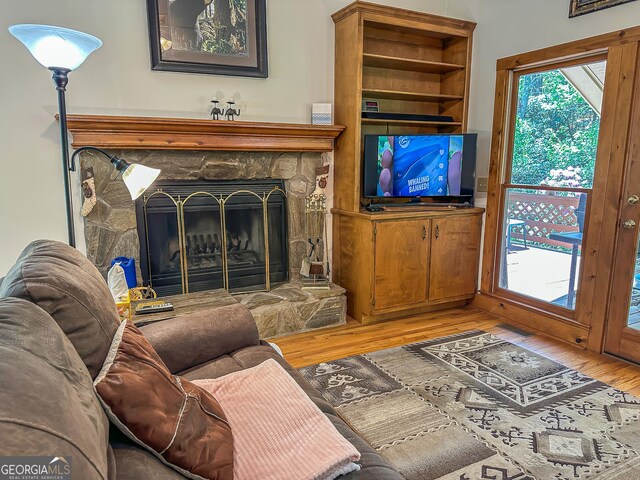 30 Putter Ln, Dillard, GA 30537 - living area with wood finished floors and a stone fireplace