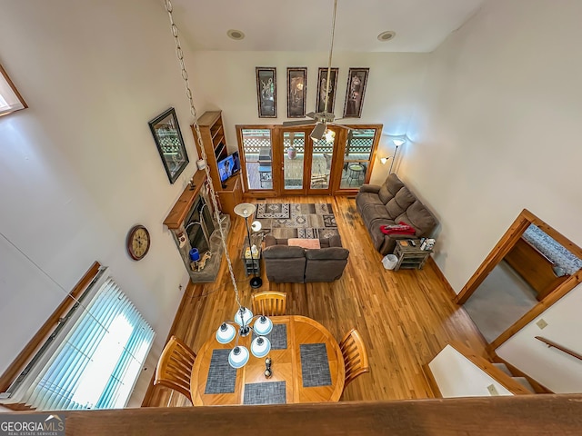 30 Putter Ln, Dillard, GA 30537 - living area featuring wood finished floors, a high ceiling, and baseboards