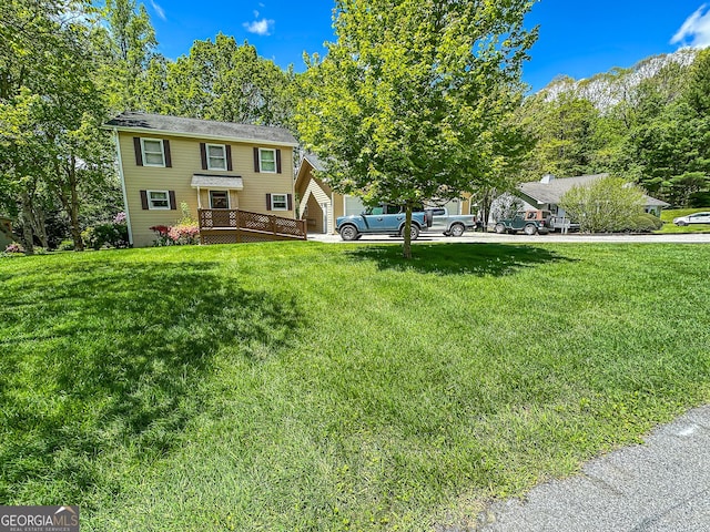 30 Putter Ln, Dillard, GA 30537 - view of front of home with a front yard and a deck