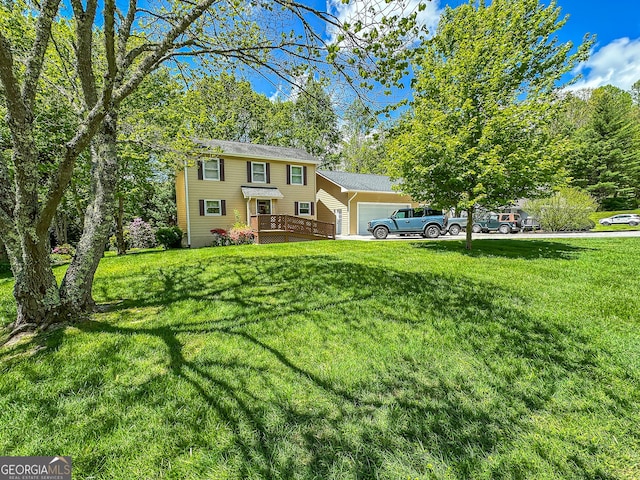 30 Putter Ln, Dillard, GA 30537 - view of front facade with a front lawn and a garage